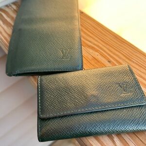 Louis Vuttion key holder and wallet.